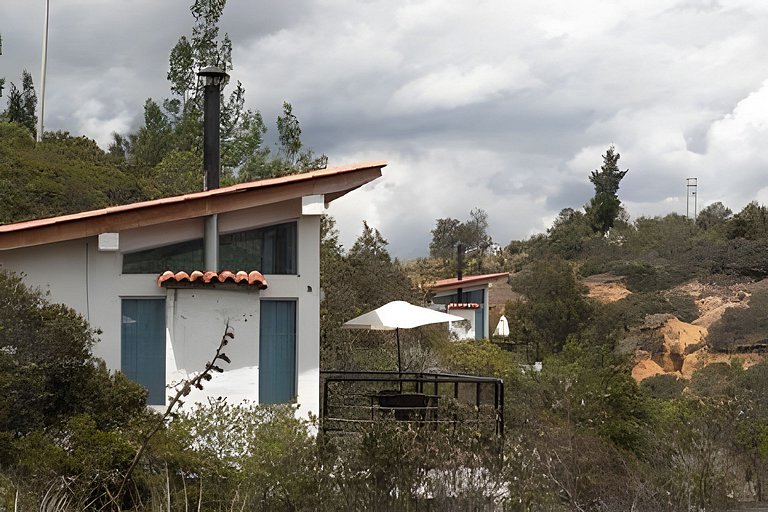 Cabaña vista al lago Tominė y Naturaleza Guatavita